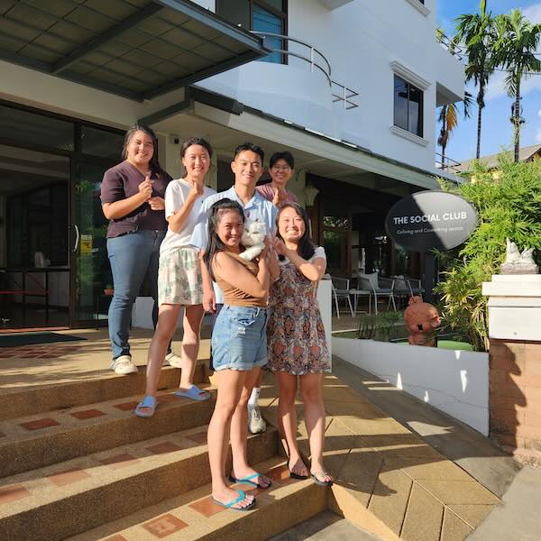 Coliving Members Standing on Stairs